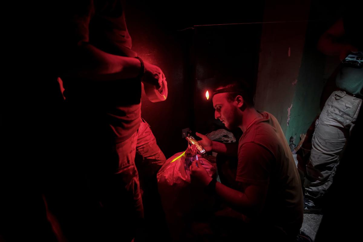 Ukrainian pilots prepare packages to be dropped by drone to soldiers fighting on the Pokrovsk front, in Myrnohrad, Ukraine, 10 June 2025. Photo: EPA/Maria Senovilla