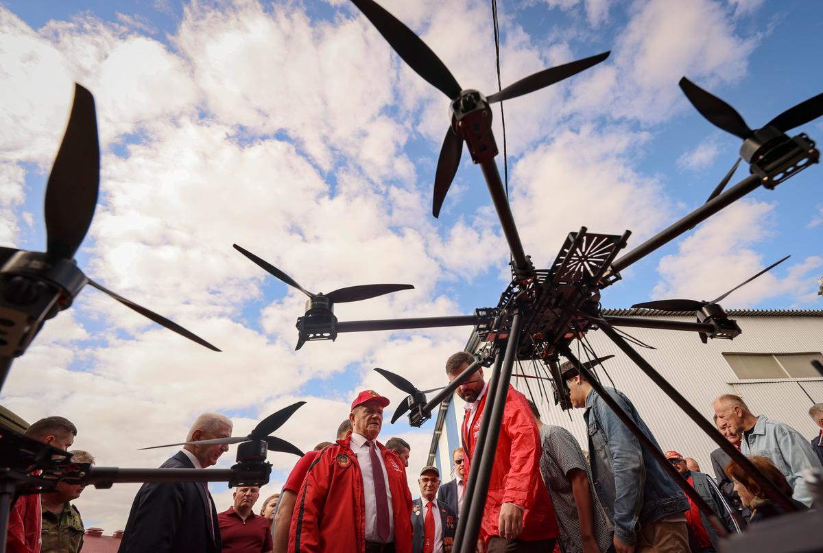 Russian Communist Party leader Gennady Zyuganov examines drones sent in a military aid package to the front line in Ukraine, outside Moscow, Russia, 8 September 2025. Photo: EPA/SERGEI ILNITSKY