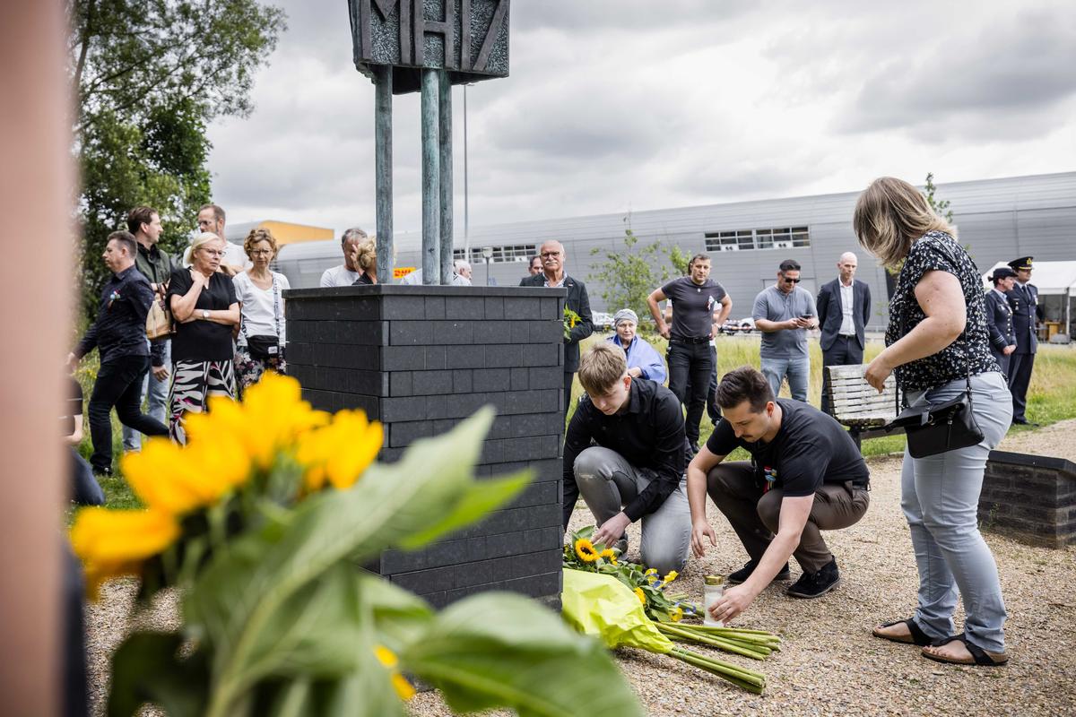 Relatives of victims lay flowers to the victims of the MH17 flight disaster at a memorial in Eindhoven, Netherlands, 23 July 2024. Photo: EPA/ROB ENGELAAR