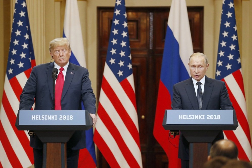 US President Donald Trump and Vladimir Putin speak to reporters after their meeting in Helsinki, Finland, 16 July 2018. Photo: EPA/ANATOLY MALTSEV