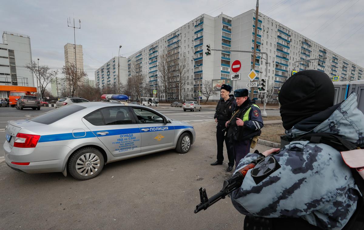 Police officers stationed near the site of the Moscow concert hall attack. Photo: EPA-EFE/YURI KOCHETKOV