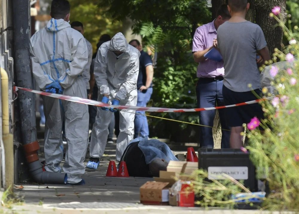 Police investigators at the scene of Parubiy's murder in Lviv, western Ukraine, 30 August 2025. Photo: Mykola Tys / EPA