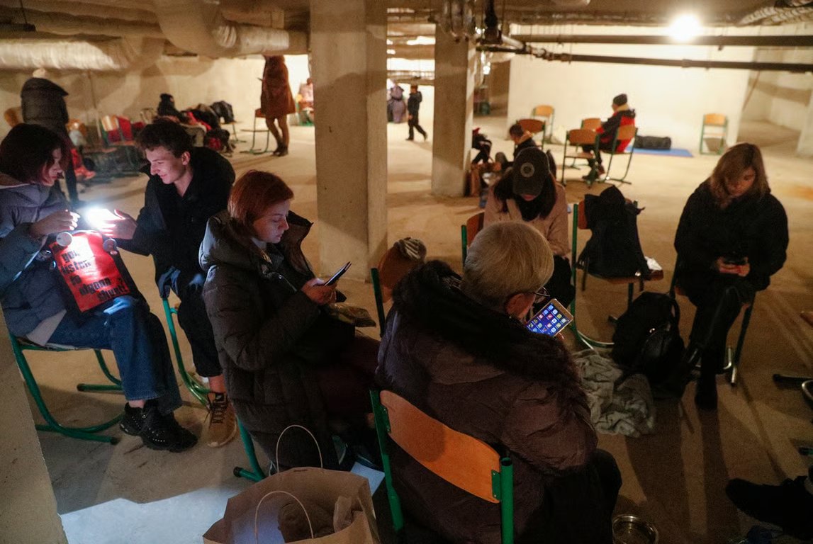 People use a school basement as a shelter, Kyiv, Ukraine, 24 February, 2022. Photo: Sergey Dolzhenko / EPA